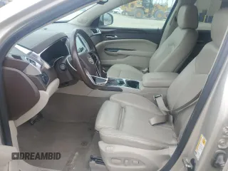 2015 Cadillac SRX Luxury Collection z VIN 3GYFNEE33FS606531, wystawiony jako Copart lot #53088485 z przebiegiem 115 140 mil mil oraz Szkody całkowita. Historia ofert i sprzedaży dostępna na DreamBid. Obrazek 7.