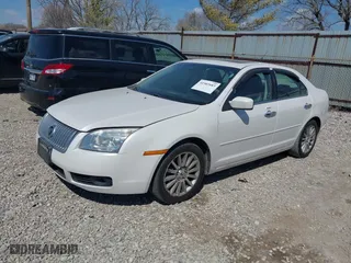 2009 Mercury Milan Premier with VIN 3MEHM08179R604385, listed as a IAAI auction lot 41902683 with 142,451 mi miles. Bid and sale history available at carsss.com. Image 2.