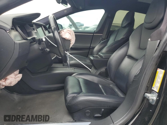 2019 Tesla Model S 75D with VIN 5YJSA1E25KF299740, listed as a Copart auction lot 55821595 with 140,385 mi miles and Salvage title. Bid and sale history available at DreamBid. Image 7.