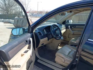 2007 Honda CR-V EX-L with VIN JHLRE38737C019763, listed as a IAAI auction lot 41933749 with 208,901 mi miles. Bid and sale history available at carsss.com. Image 5.