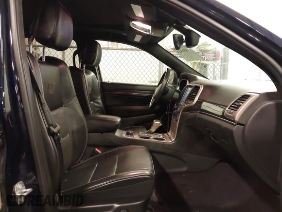 2017 Jeep Grand Cherokee Overland with VIN 1C4RJFCG3HC693897, listed as a IAAI auction lot 41636323 with 105,575 mi miles. Bid and sale history available at carsss.com. Image 5.