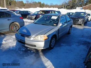 1998 Honda Civic EX with VIN 1HGEJ8242WL114947, listed as a IAAI auction lot 41630431 with 124,702 mi miles. Bid and sale history available at carsss.com. Image 2.