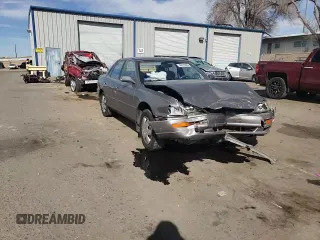 1994 Toyota Camry LE z VIN JT2GK12E2R0050878, wystawiony jako Copart lot #46878005 z przebiegiem 152 211 mil mil oraz Szkoda całkowita • Salvage title. Historia ofert i sprzedaży dostępna na DreamBid. Obrazek 11.