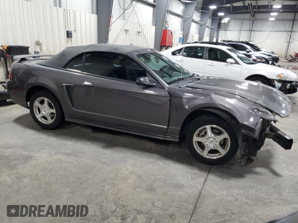 2003 Ford Mustang Deluxe z VIN 1FAFP44433F369534, wystawiony jako Copart lot #76606794 z przebiegiem 88 503 mil mil oraz Szkoda całkowita • Salvage title. Historia ofert i sprzedaży dostępna na DreamBid. Obrazek 4.