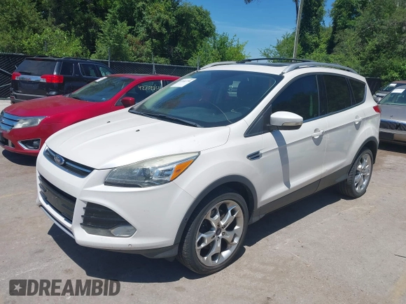2013 Ford Escape Titanium with VIN 1FMCU9J94DUD32777, listed as a IAAI auction lot 42683798 with 197,857 mi miles and . Bid and sale history available at DreamBid. Image 2.