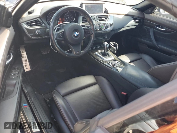 2013 BMW Z4 sDrive35i with VIN WBALM7C58DE385458, listed as a Copart auction lot 77959004 with 43,616 mi miles and Salvage Title. Bid and sale history available at carsss.com. Image 8.