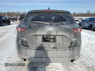 2021 Mazda CX-5 Grand Touring with VIN JM3KFBDM5M1456650, listed as a Copart auction lot 42124045 with 45,205 mi miles and Salvage Title. Bid and sale history available at carsss.com. Image 6.