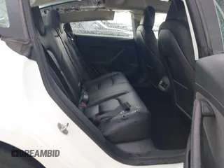 2023 Tesla Model 3 Performance z VIN 5YJ3E1EC8PF487550, wystawiony jako IAAI lot #42093712 z przebiegiem 27 305 mil mil oraz . Historia ofert i sprzedaży dostępna na DreamBid. Obrazek 8.