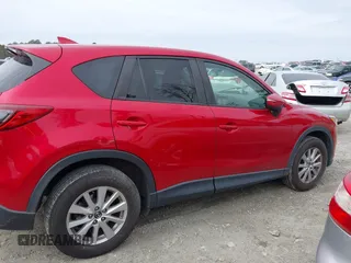 2016 Mazda CX-5 Touring z VIN JM3KE2CY3G0894441, wystawiony jako IAAI lot #41508767 z przebiegiem 88 554 mil mil oraz . Historia ofert i sprzedaży dostępna na DreamBid. Obrazek 13.