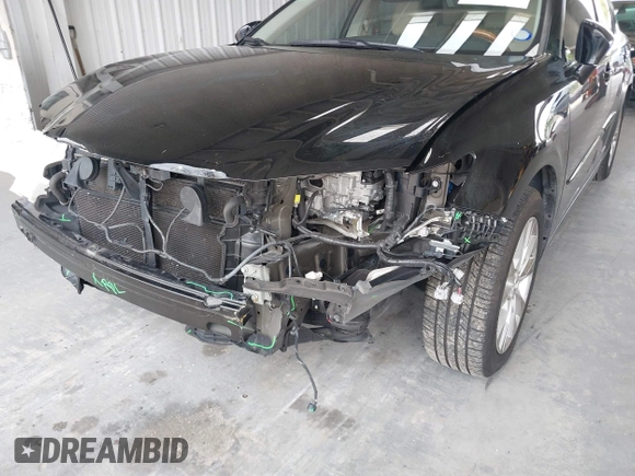 2014 Lexus ES 300h with VIN JTHBW1GG9E2043696, listed as a IAAI auction lot 42392424 with 74,370 mi miles and . Bid and sale history available at DreamBid. Image 6.