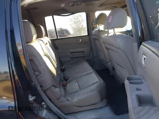 2012 Honda Pilot EX-L with VIN 5FNYF3H60CB035624, listed as a IAAI auction lot 41321568 with 309,545 mi miles and . Bid and sale history available at DreamBid. Image 8.