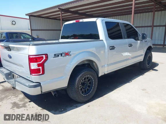 2018 Ford F-150 XL with VIN 1FTEW1CP6JKF36573, listed as a IAAI auction lot 42314415 with 121,240 mi miles and . Bid and sale history available at DreamBid. Image 4.