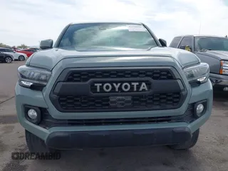 2022 Toyota Tacoma SR with VIN 3TMCZ5AN0NM507320, listed as a IAAI auction lot 42220296 with 33,342 mi miles and . Bid and sale history available at DreamBid. Image 12.