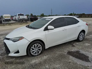 2019 Toyota Corolla L z VIN 5YFBURHE8KP922123, wystawiony jako Copart lot #58805035 z przebiegiem 111 250 mil mil oraz Czysty tytuł • Clean title. Historia ofert i sprzedaży dostępna na DreamBid. Obrazek 1.