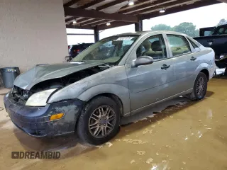 2006 Ford Focus S with VIN 1FAHP34N66W177637, listed as a Copart auction lot 54007975 with 212,331 mi miles and Salvage title. Bid and sale history available at DreamBid. Image 1.
