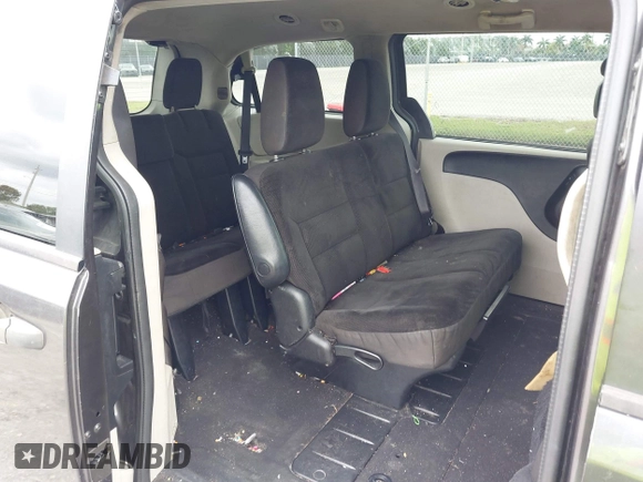 2019 Dodge Grand Caravan SE with VIN 2C4RDGBGXKR796974, listed as a IAAI auction lot 42008704 with 129,229 mi miles and . Bid and sale history available at DreamBid. Image 8.