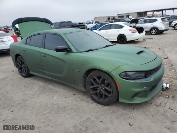 2019 Dodge Charger R/T with VIN 2C3CDXCTXKH633124, listed as a Copart auction lot 43935055 with 106,184 mi miles and Salvage Title. Bid and sale history available at carsss.com. Image 4.