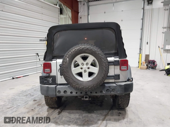 2008 Jeep Wrangler Unlimited X with VIN 1J4GA391X8L647311, listed as a IAAI auction lot 41499620 with 140,601 mi miles and . Bid and sale history available at carsss.com. Image 16.