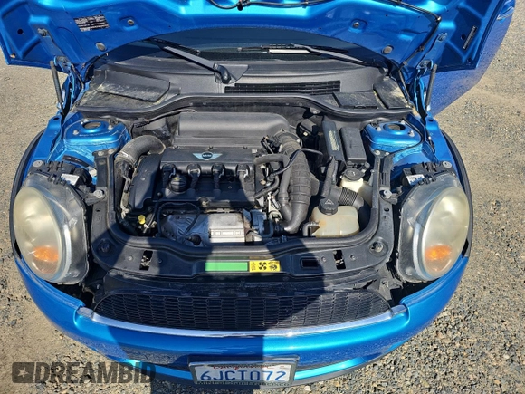 2009 MINI Hardtop S with VIN WMWMF73519TW86705, listed as a Copart auction lot 52047985 with 80,443 mi miles and Clean title. Bid and sale history available at DreamBid. Image 7.