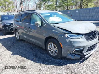 2022 Chrysler Pacifica Touring L z VIN 2C4RC1BG4NR169501, wystawiony jako IAAI lot #41833414 z przebiegiem 60 856 mil mil oraz . Historia ofert i sprzedaży dostępna na DreamBid. Obrazek 1.