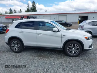 2018 Mitsubishi Outlander ES z VIN JA4AP3AU1JZ005296, wystawiony jako IAAI lot #42327265 z przebiegiem 91 300 mil mil oraz . Historia ofert i sprzedaży dostępna na DreamBid. Obrazek 13.