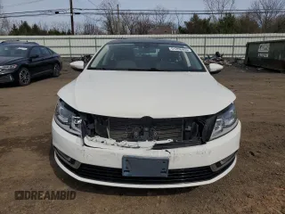 2014 Volkswagen CC Executive z VIN WVWRP7AN8EE525596, wystawiony jako Copart lot #51208465 z przebiegiem 192 673 mil mil oraz Szkoda całkowita • Salvage title. Historia ofert i sprzedaży dostępna na DreamBid. Obrazek 5.