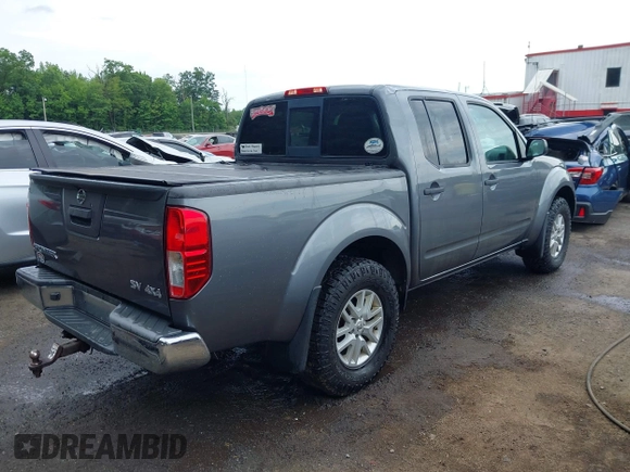 2018 Nissan Frontier SV with VIN 1N6AD0EV4JN726457, listed as a IAAI auction lot 42348883 with 97,880 mi miles and . Bid and sale history available at DreamBid. Image 4.