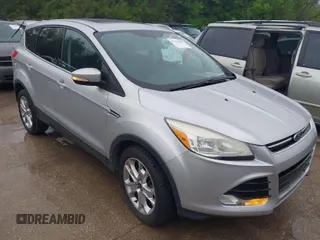 2013 Ford Escape SEL with VIN 1FMCU0H99DUC72013, listed as a IAAI auction lot 41952599 with 177,081 mi miles. Bid and sale history available at carsss.com. Image 1.