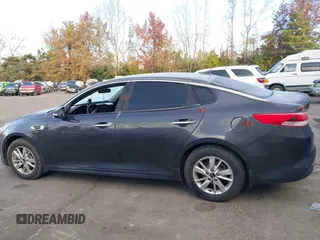 2017 Kia Optima LX with VIN 5XXGT4L32HG156845, listed as a IAAI auction lot 41402224 with 126,529 mi miles. Bid and sale history available at carsss.com. Image 14.