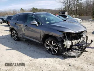 2018 Lexus RX 350L Premium with VIN JTJDZKCA8J2009751, listed as a Copart auction lot 51042215 with 104,454 mi miles and Salvage Title. Bid and sale history available at DreamBid. Image 4.