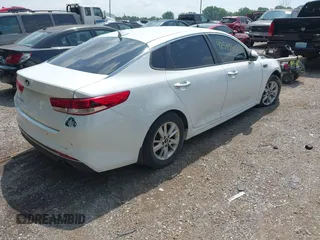 2018 Kia Optima LX with VIN 5XXGT4L36JG210914, listed as a IAAI auction lot 42545614 with 126,286 mi miles and . Bid and sale history available at DreamBid. Image 4.
