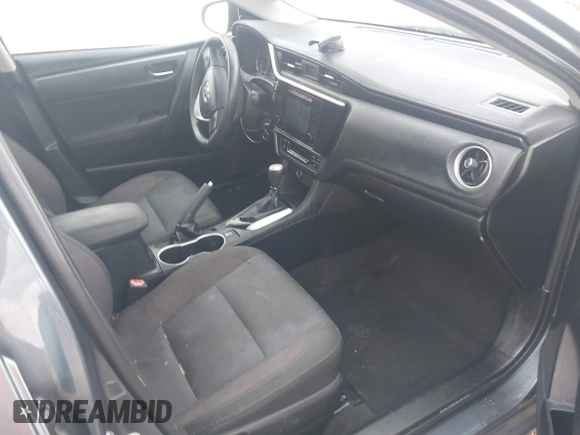 2018 Toyota Corolla L with VIN 2T1BURHE9JC973564, listed as a IAAI auction lot 42356511 with 207,501 mi miles and . Bid and sale history available at DreamBid. Image 5.