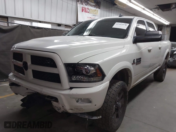 2017 Ram 2500 Laramie with VIN 3C6UR5FL1HG726325, listed as a IAAI auction lot 42315570 with 104,038 mi miles and . Bid and sale history available at DreamBid. Image 2.