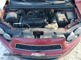 2012 Chevrolet Sonic LS z VIN 1G1JA6SH3C4128973, wystawiony jako Copart lot #87795975 z przebiegiem 100 178 mil mil oraz Czysty tytuł • Clean title. Historia ofert i sprzedaży dostępna na DreamBid. Obrazek 11.