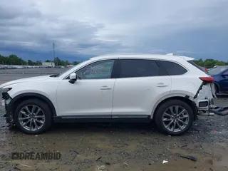 2019 Mazda CX-9 Signature with VIN JM3TCBEY6K0307102, listed as a IAAI auction lot 42645716 with 55,299 mi miles and . Bid and sale history available at DreamBid. Image 15.