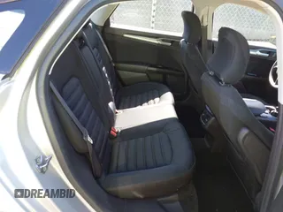 2015 Ford Fusion SE Hybrid with VIN 3FA6P0LUXFR296373, listed as a IAAI auction lot 42600980 with 76,985 mi miles and . Bid and sale history available at DreamBid. Image 8.