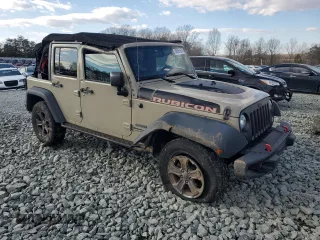 2018 Jeep Wrangler JK Unlimited Rubicon with VIN 1C4BJWFG7JL832917, listed as a Copart auction lot 88866165 with 83,598 mi miles and Salvage Title. Bid and sale history available at carsss.com. Image 4.