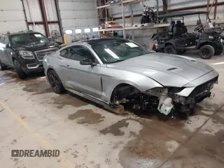 2021 Ford Mustang EcoBoost with VIN 1FA6P8TH1M5127800, listed as a IAAI auction lot 41625544 with 82,531 mi miles. Bid and sale history available at carsss.com. Image 1.