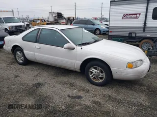 1996 Ford Thunderbird LX with VIN 1FALP6246TH160357, listed as a IAAI auction lot 41442234 with 99,815 mi miles and . Bid and sale history available at DreamBid. Image 1.