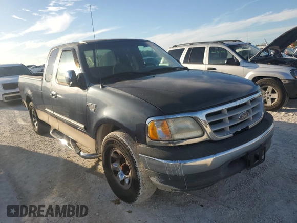 1999 Ford F-250 with VIN 1FTRX27L8XNB35593, listed as a Copart auction lot 77008354 with Not provided miles and Salvage title. Bid and sale history available at DreamBid. Image 4.