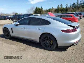2018 Porsche Panamera z VIN WP0AA2A75JL110423, wystawiony jako Copart lot #48962705 z przebiegiem 118 453 mil mil oraz Czysty tytuł • Clean title. Historia ofert i sprzedaży dostępna na DreamBid. Obrazek 2.