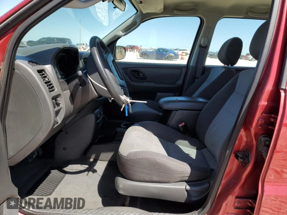 2003 Ford Escape XLS Popular z VIN 1FMYU02133KE09143, wystawiony jako Copart lot #53659105 z przebiegiem 78 736 mil mil oraz Szkoda całkowita • Salvage title. Historia ofert i sprzedaży dostępna na DreamBid. Obrazek 7.