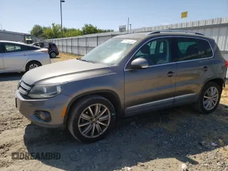 2012 Volkswagen Tiguan SE with VIN WVGAV7AX9CW006161, listed as a Copart auction lot 61789085 with 201,628 mi miles and Salvage title. Bid and sale history available at DreamBid. Image 1.