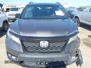 2019 Honda Passport Elite with VIN 5FNYF8H04KB004657, listed as a IAAI auction lot 41993974 with 90,964 mi miles and . Bid and sale history available at DreamBid. Image 12.