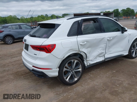 2022 Audi Q3 S line Premium Plus with VIN WA1EECF39N1025078, listed as a IAAI auction lot 42210251 with 28,841 mi miles and . Bid and sale history available at DreamBid. Image 4.