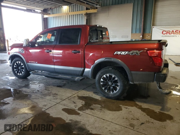 2017 Nissan Titan Platinum Reserve with VIN 1N6AA1E52HN501110, listed as a Copart auction lot 48202935 with 83,674 mi miles and Salvage title. Bid and sale history available at DreamBid. Image 2.