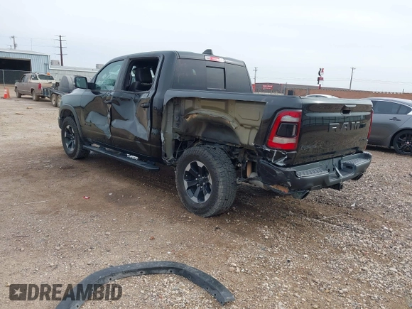 2020 Ram 1500 Rebel with VIN 1C6SRFLT5LN113514, listed as a IAAI auction lot 41718662 with 56,730 mi miles and . Bid and sale history available at DreamBid. Image 3.