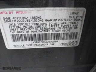 2010 Mitsubishi Lancer DE with VIN JA32U1FU3AU030048, listed as a IAAI auction lot 41953386 with 216,341 mi miles. Bid and sale history available at carsss.com. Image 9.