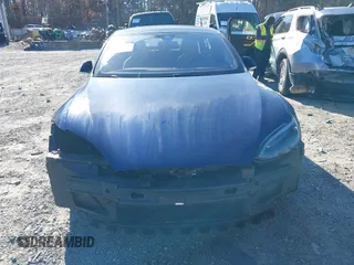 2016 Tesla Model S 90D with VIN 5YJSA1E25GF144614, listed as a IAAI auction lot 40941311 with 83,587 mi miles and . Bid and sale history available at DreamBid. Image 6.