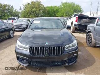 2017 BMW 7 Series 750i with VIN WBA7F0C55HGM21460, listed as a IAAI auction lot 41934198 with 58,206 mi miles and . Bid and sale history available at DreamBid. Image 12.